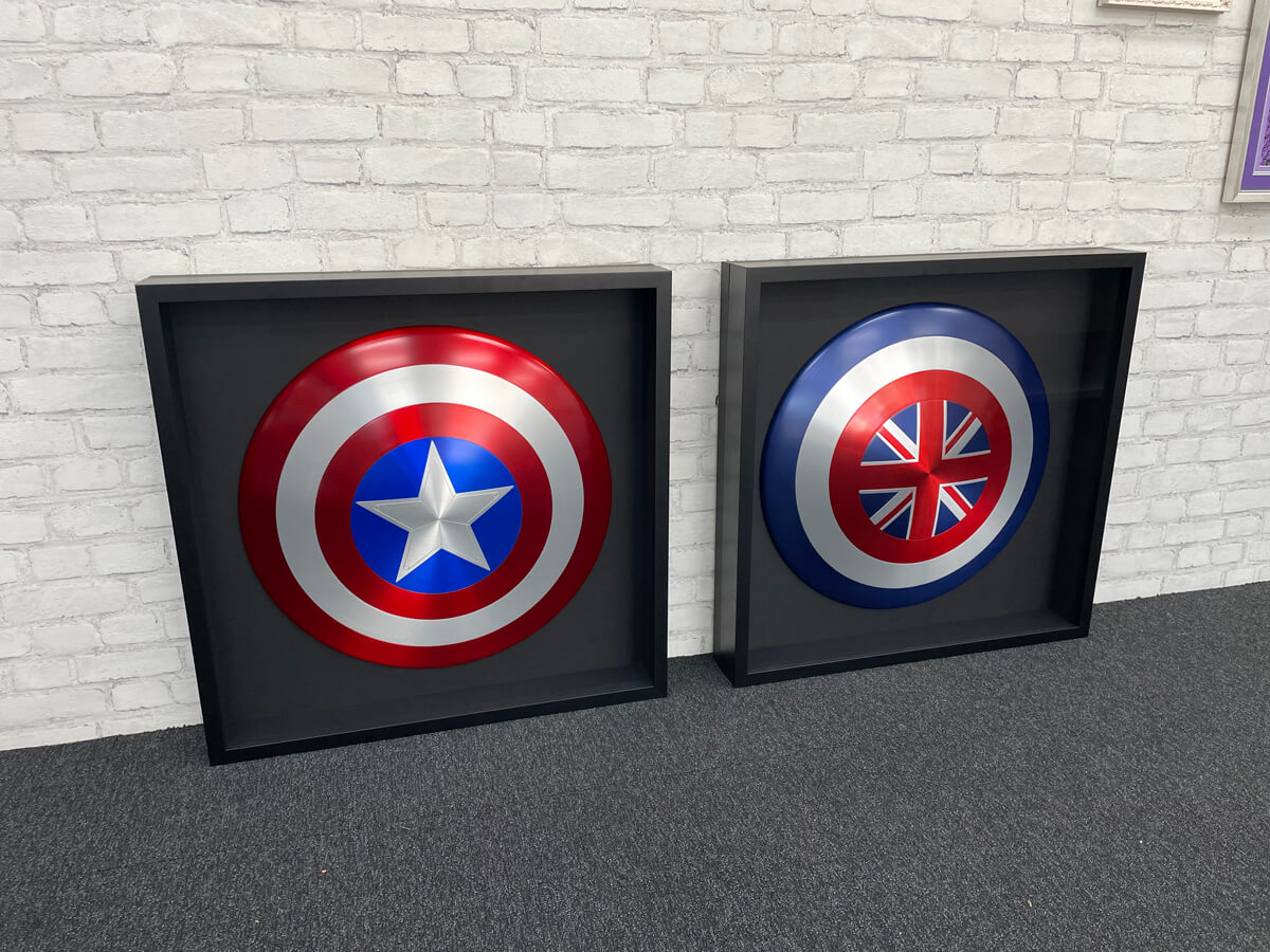 Framed Captain America shields