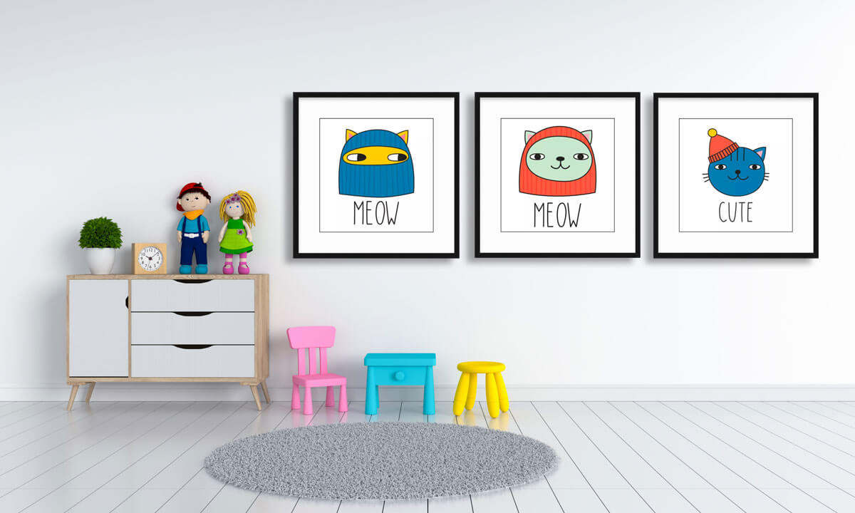 Kids cat art in black frame with white matboard