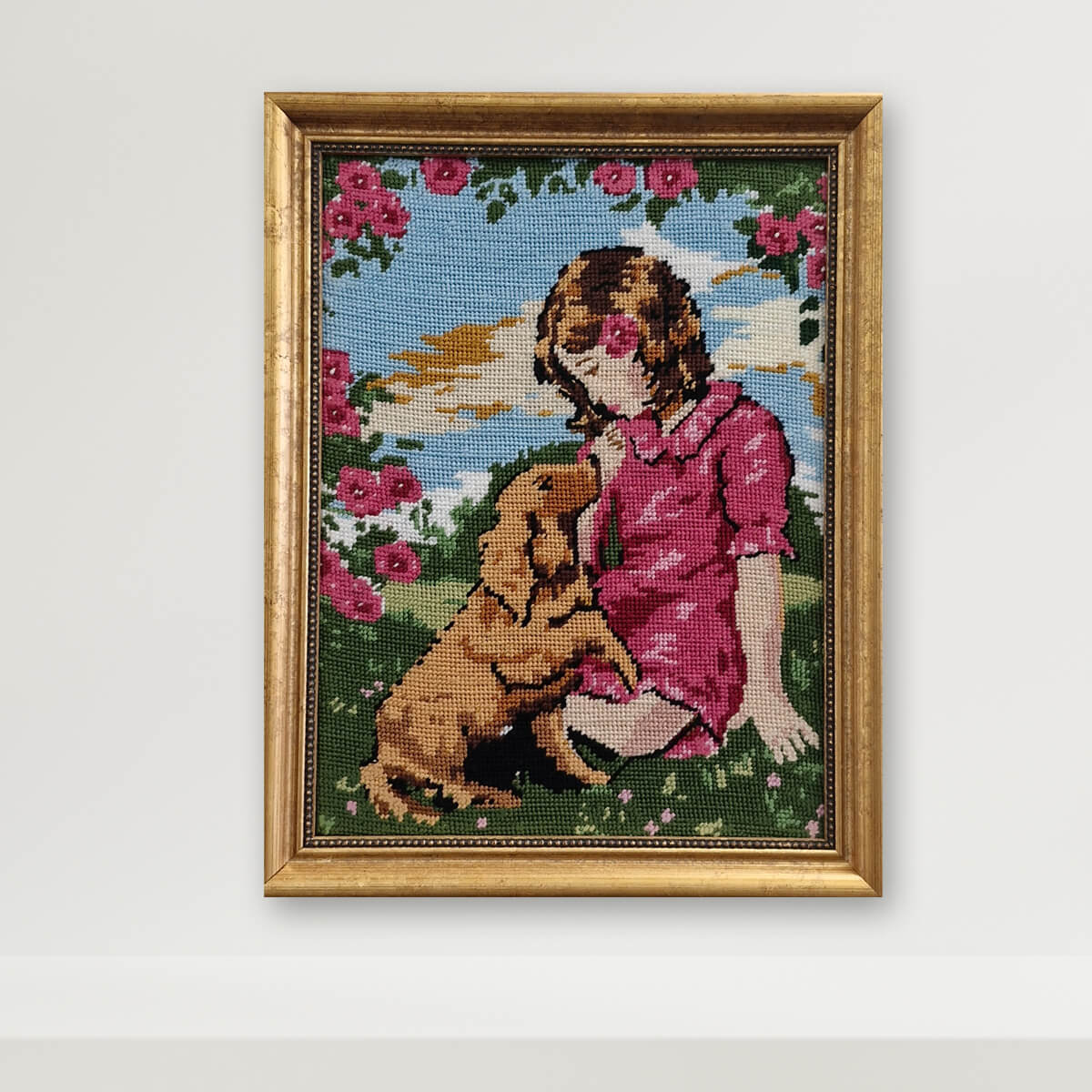 Embroidery framed in gold frame