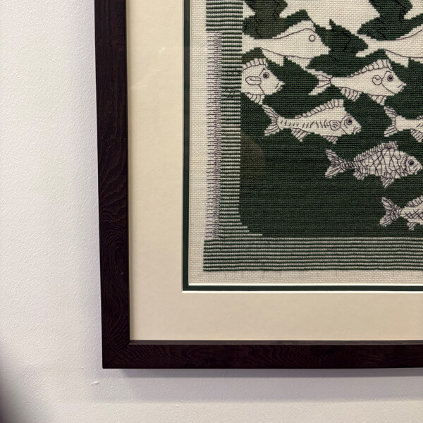 Stretched framed needlework corner detail Corner detail of stretched and framed needlework