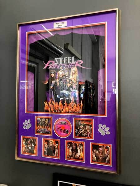 framed music memorabilia